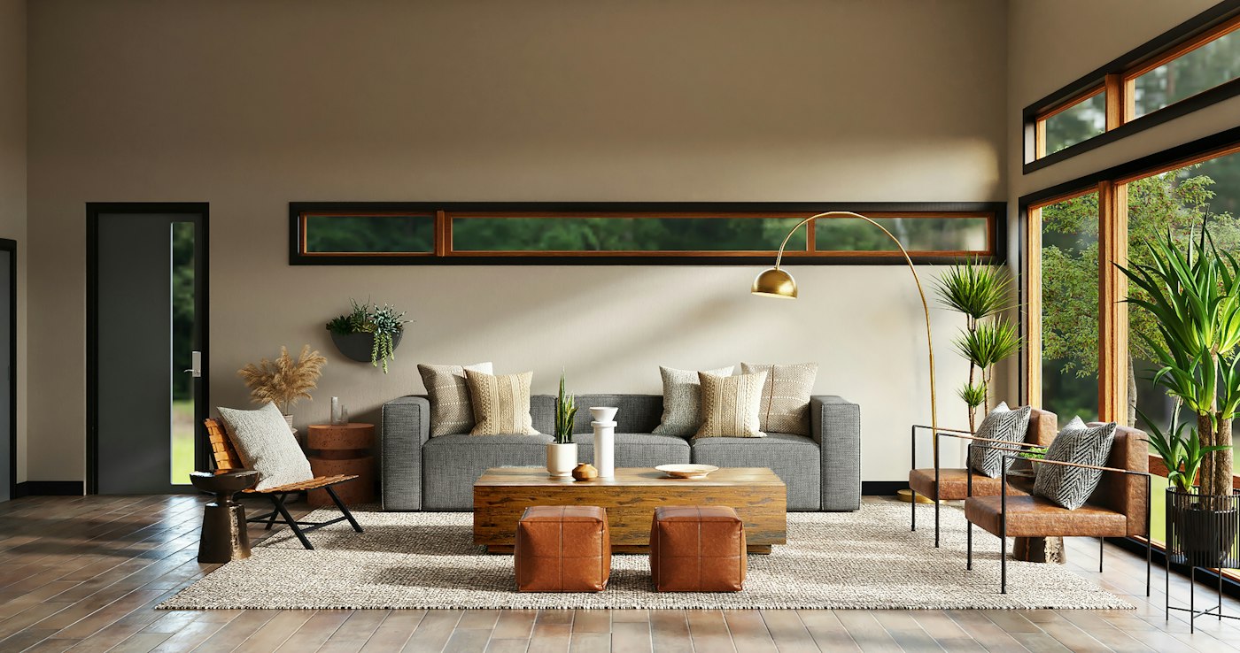 Open villa living room with low sofas and clerestory windows